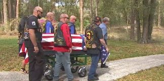 bikers carry veteran casket tribute